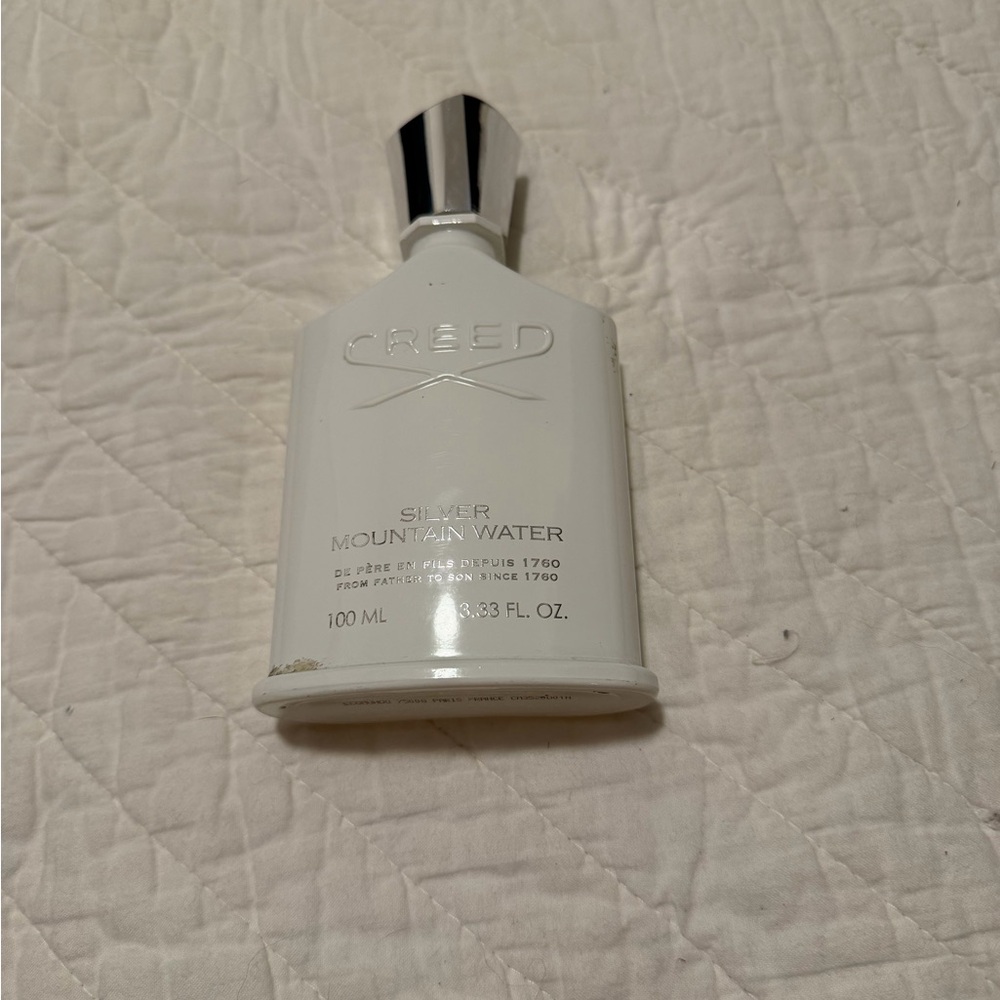 Creed Silver Mountain Water in White and Silver